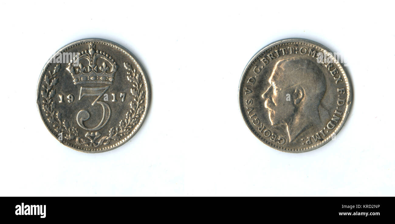 Britische Münze, George V. Silber, drei Penny Stockfoto