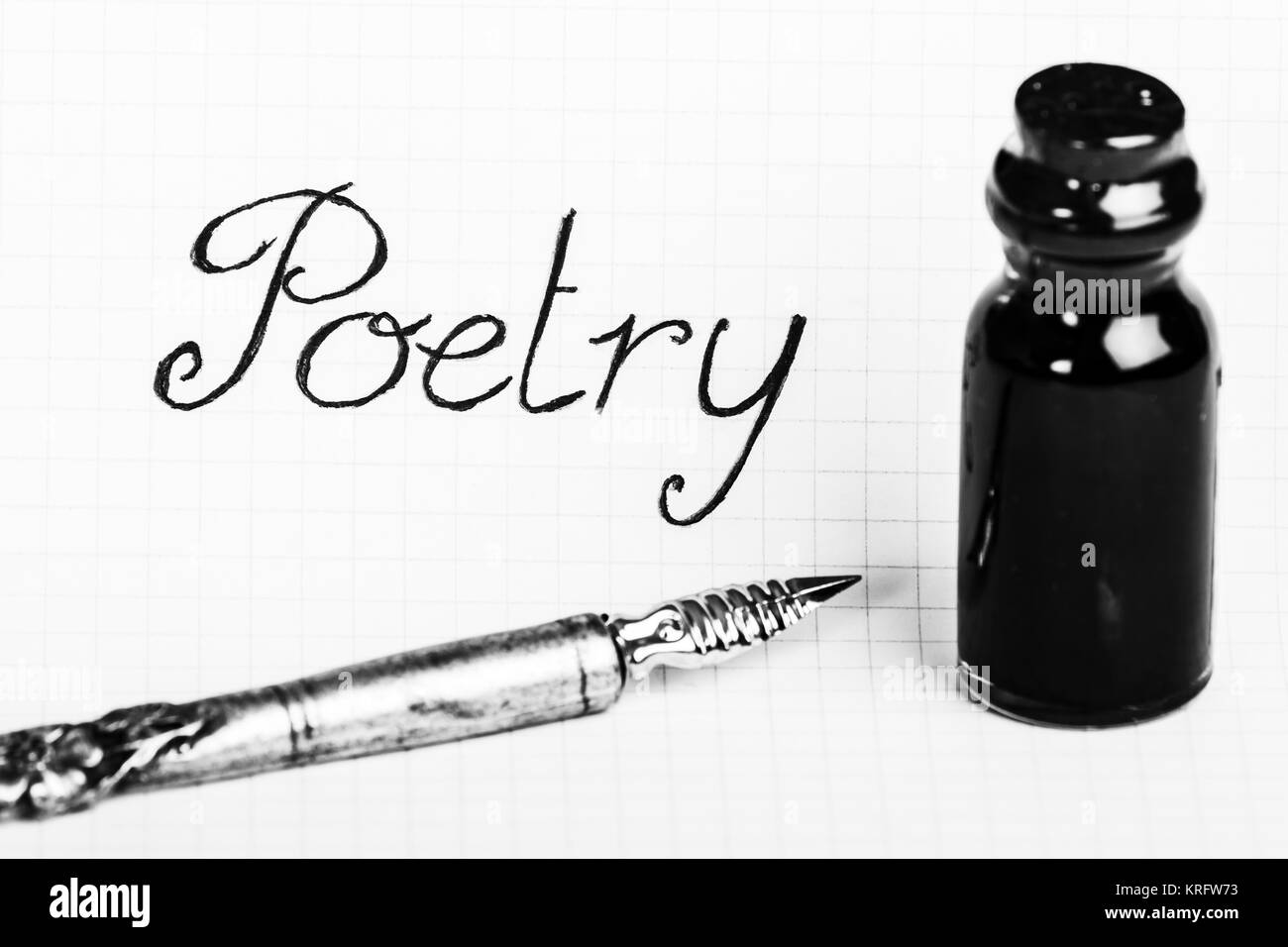 Alte Feder und Tinte Flasche für Poesie Stockfoto