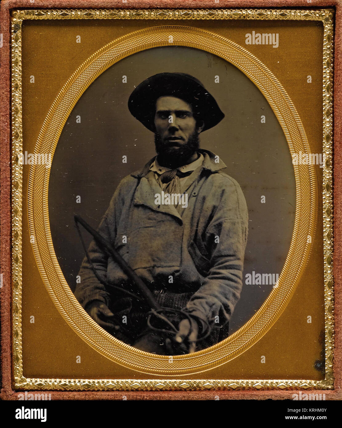 Muleskinner Holding eine Peitsche Stockfoto