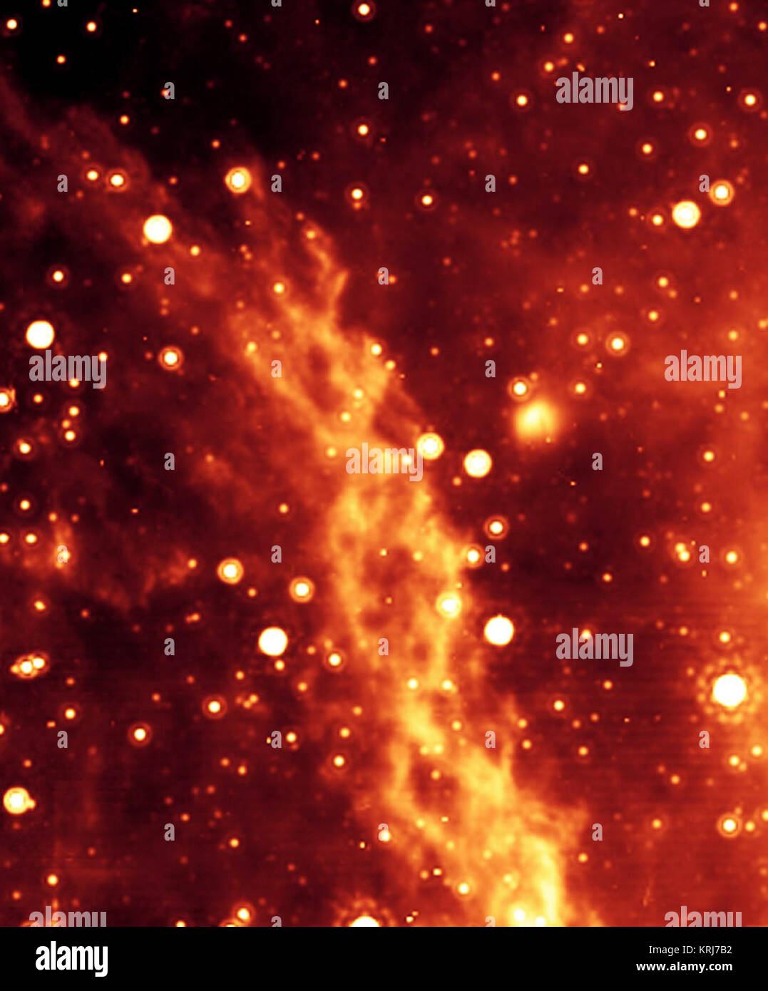 Die Double Helix Nebula. Die Spots sind Infrarot-leuchtenden Sterne, meist rote Riesen und Roten Überriesen. Viele andere Sterne sind in dieser Region vorhanden, sind aber zu dim auch in diesem sensiblen Infrarot Bild erscheint. Die doppelhelix Nebel ist rund 300 Lichtjahre von der riesigen Schwarzen Loch im Zentrum der Milchstraße. (Die Erde ist mehr als 25.000 Lichtjahre vom Schwarzen Loch im galaktischen Zentrum.) Das Falschfarbenbild Von der Multiband Imaging Photometer für Spitzer (MIPS) genommen wurde. False-Color Bild von Double Helix Nebula Stockfoto