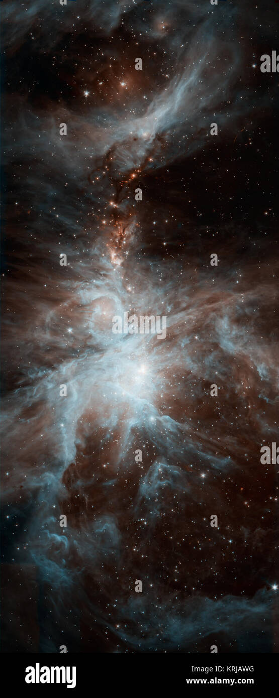 Eine Kolonie von heiße, junge Sterne ist das kosmische Szene in diesem neuen Bild von NASA's Spitzer Space Telescope. Das Bild zeigt den Orionnebel, ein Ort, wo Sterne geboren werden. Die jungen Stars dip und Peak in der Helligkeit aufgrund einer Vielzahl von Gründen. Schalten kalte und warme Stellen auf die Oberflächen der Sterne Ursache Helligkeit zu ändern, zusätzlich zu den umliegenden Festplatten klumpig Planet - Material, das Starlight behindern können. Spitzer ist der junge Sterne, die Bereitstellung von Daten über die wechselnden Weisen. Die heissesten Stars in der Region, die so genannte Trapezium Cluster sind Br Stockfoto