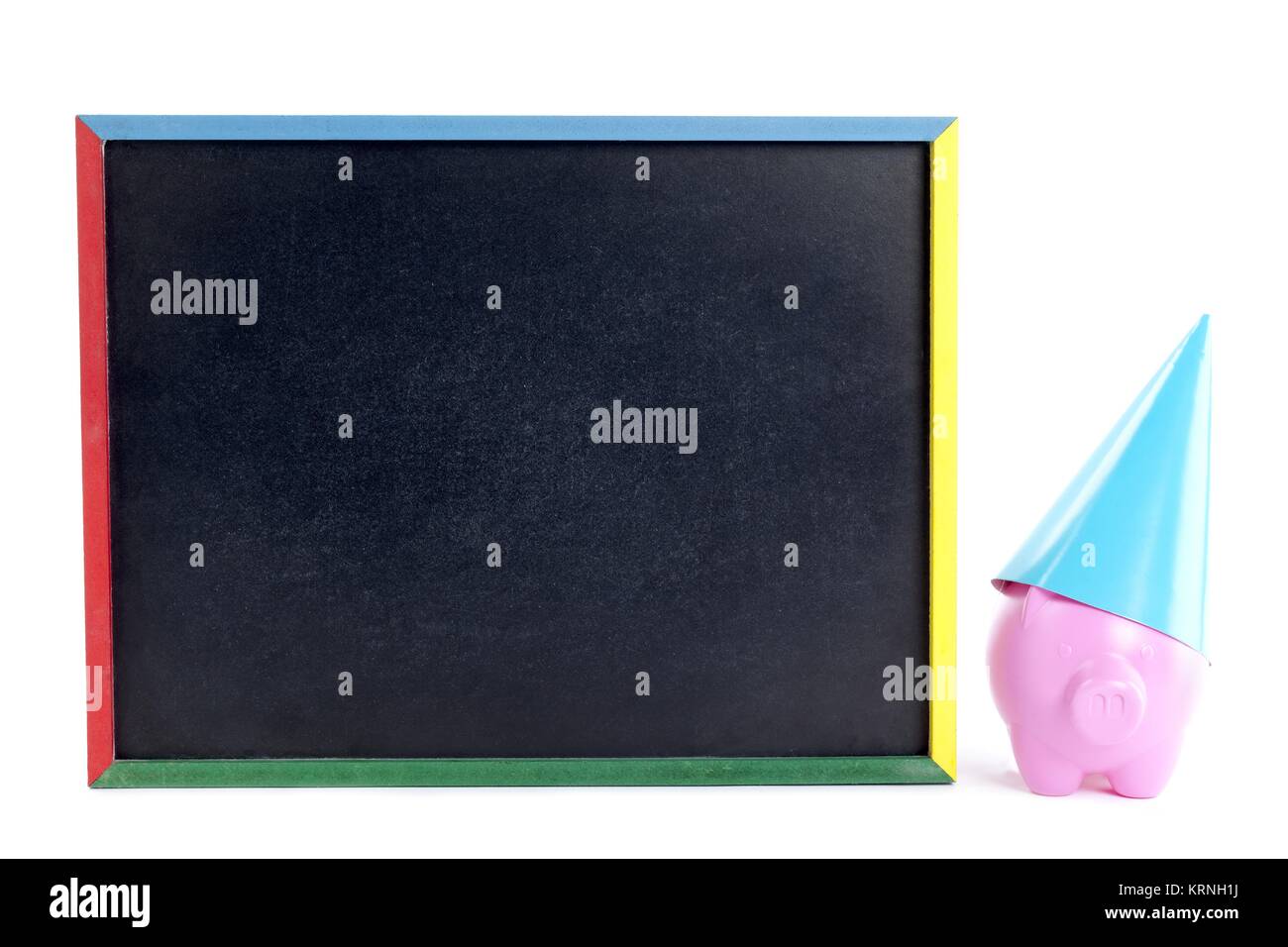 Rosa Schweinchen mit schwarzen Brett Stockfoto