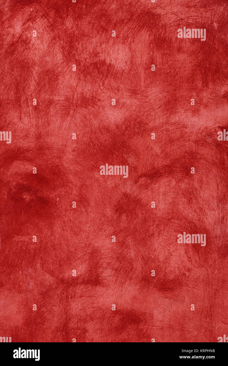 Grunge Burgund rot leuchtenden unebenen Alten daub Pflasterwand Textur Hintergrund mit Flecken und Pinselstriche, in der Nähe Stockfoto