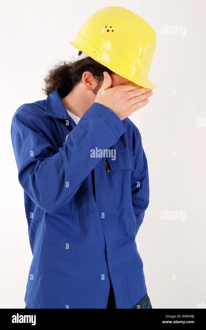 Bauarbeiter Mit Blaumann Und Bauhelm, Symbolbild Schwarzarbeiter - Bau Arbeiter Stockfoto