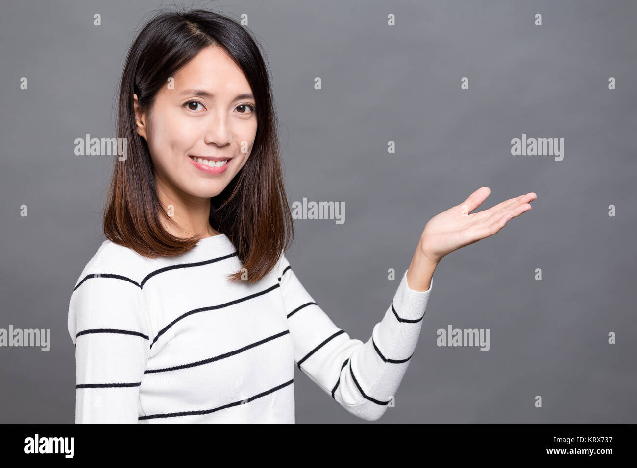 Asiatische Frau, öffnen Sie Palm Stockfoto