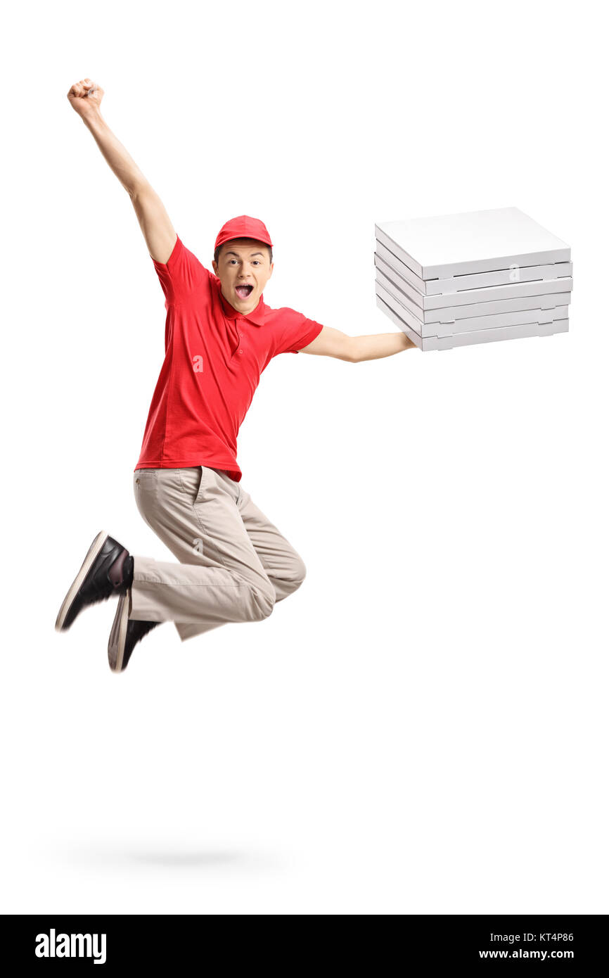 Teenage Pizza Delivery boy Jumping und gestikulierend Glück auf weißem Hintergrund überglücklich Stockfoto