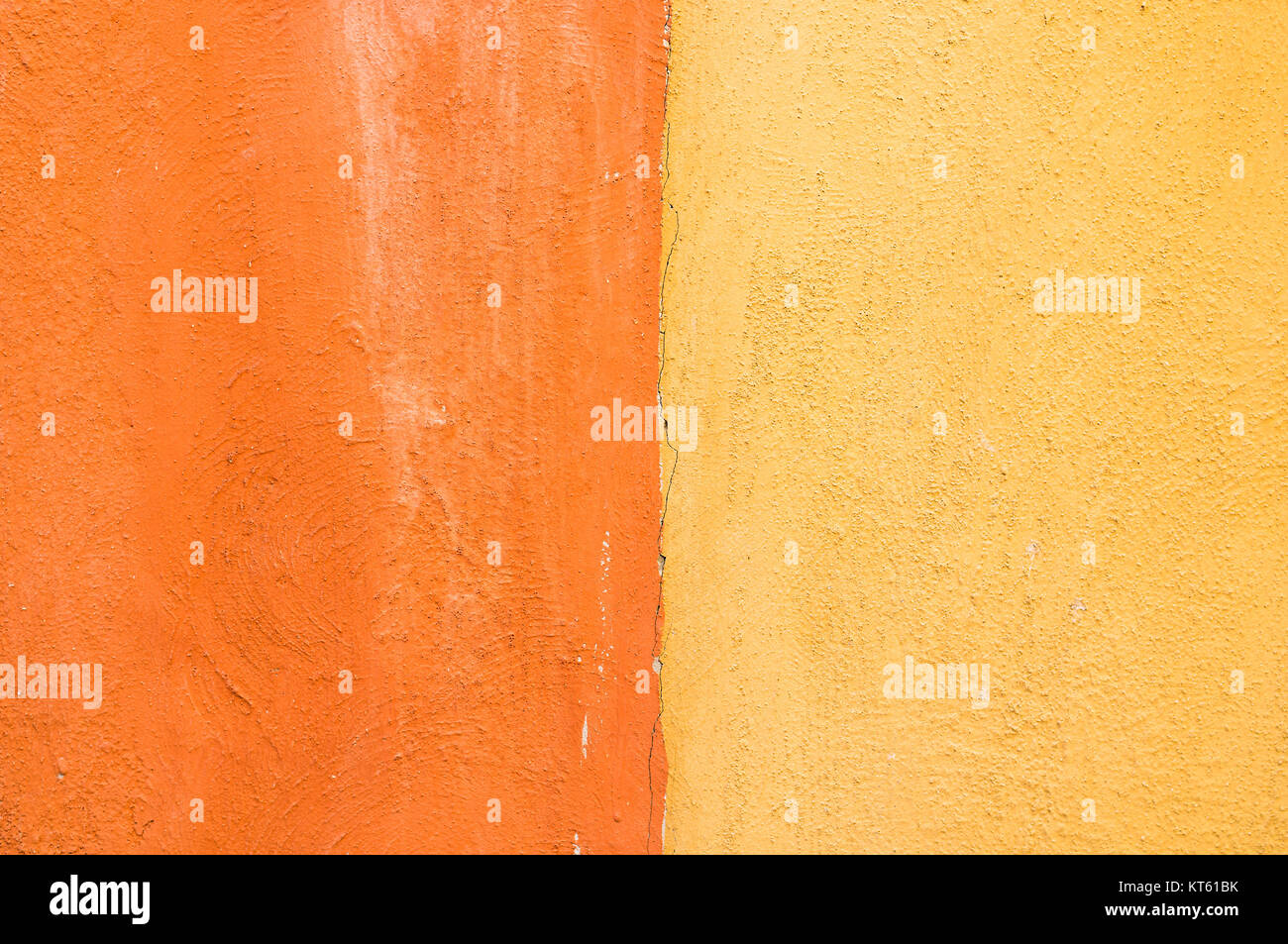 Close-up gelb und orange Farbe Beton Wand Hintergrund. Textur Hintergrund. Stockfoto