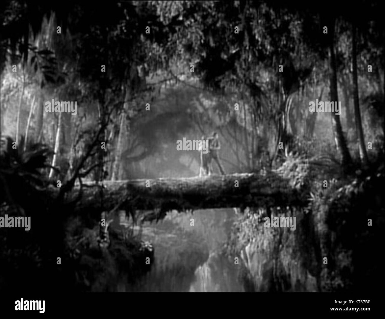 Dieses Werbebild aus dem Film *The Most Dangerous Game* aus dem Jahr 1932 zeigt die angespannte Atmosphäre des Films. Der Film basiert auf der Kurzgeschichte von Richard Connell und ist einer der ersten Thriller-Filme, in denen die Jagd nach Menschen als Spiel dargestellt wird. Stockfoto