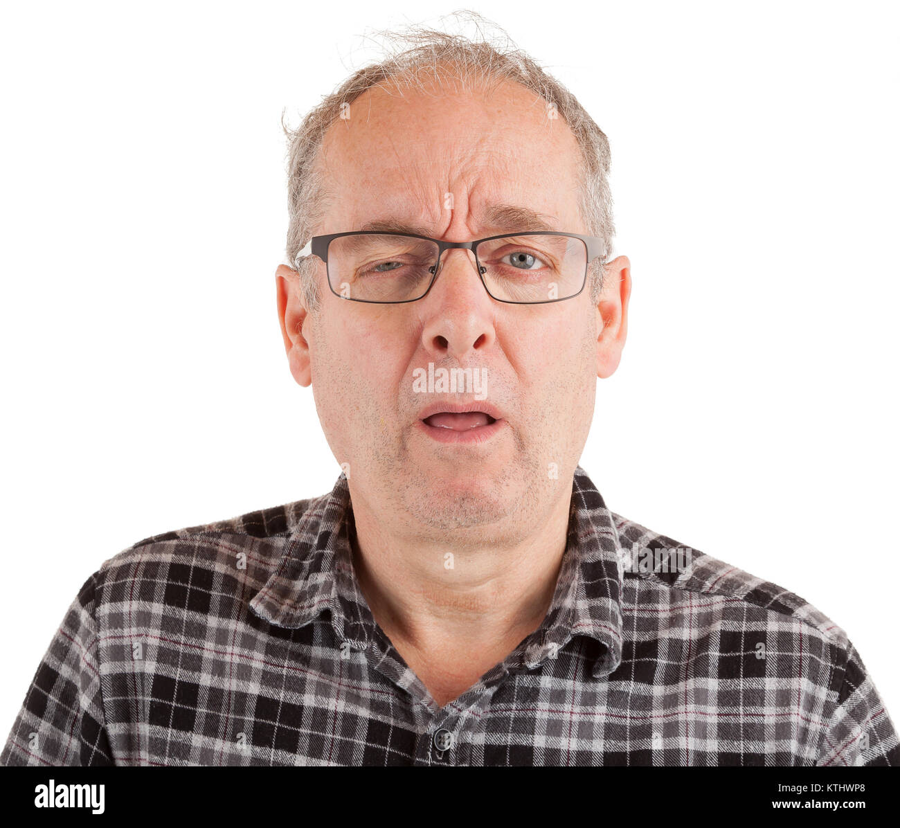 Mann unentschlossen und procrastinating über etwas Stockfoto