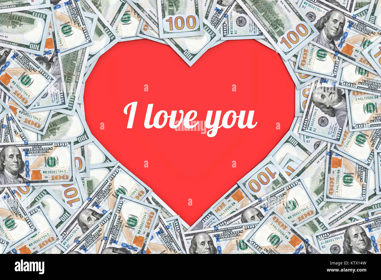 In Herzform Schild mit vielen 100 Dollar Banknoten. cash Geschenk für einen geliebten Menschen. Beschriftung ich liebe Dich. Valentine. 14 Feb, Februar Stockfoto