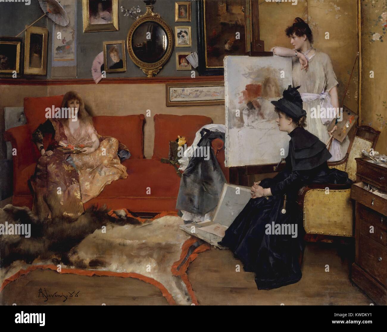 Im Studio, von Alfred Stevens, 1888, Belgische Malerei, Öl auf Leinwand. Drei Frauen in einem eleganten Pariser Künstler Studio: Modell, Künstler und ein Besucher. Das Modell ist kostümiert mit Requisiten aus berühmten regnault's Malerei 1870 der Salome. Zu den Details gehören ein Portfolio öffnen, Bild-im-Bild und ein runder Spiegel reflektieren einen Kohleofen (BSLOC 2017 9 63) Stockfoto