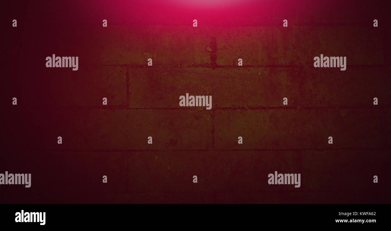 Rosa Licht gegen grüne Wand Stockfoto