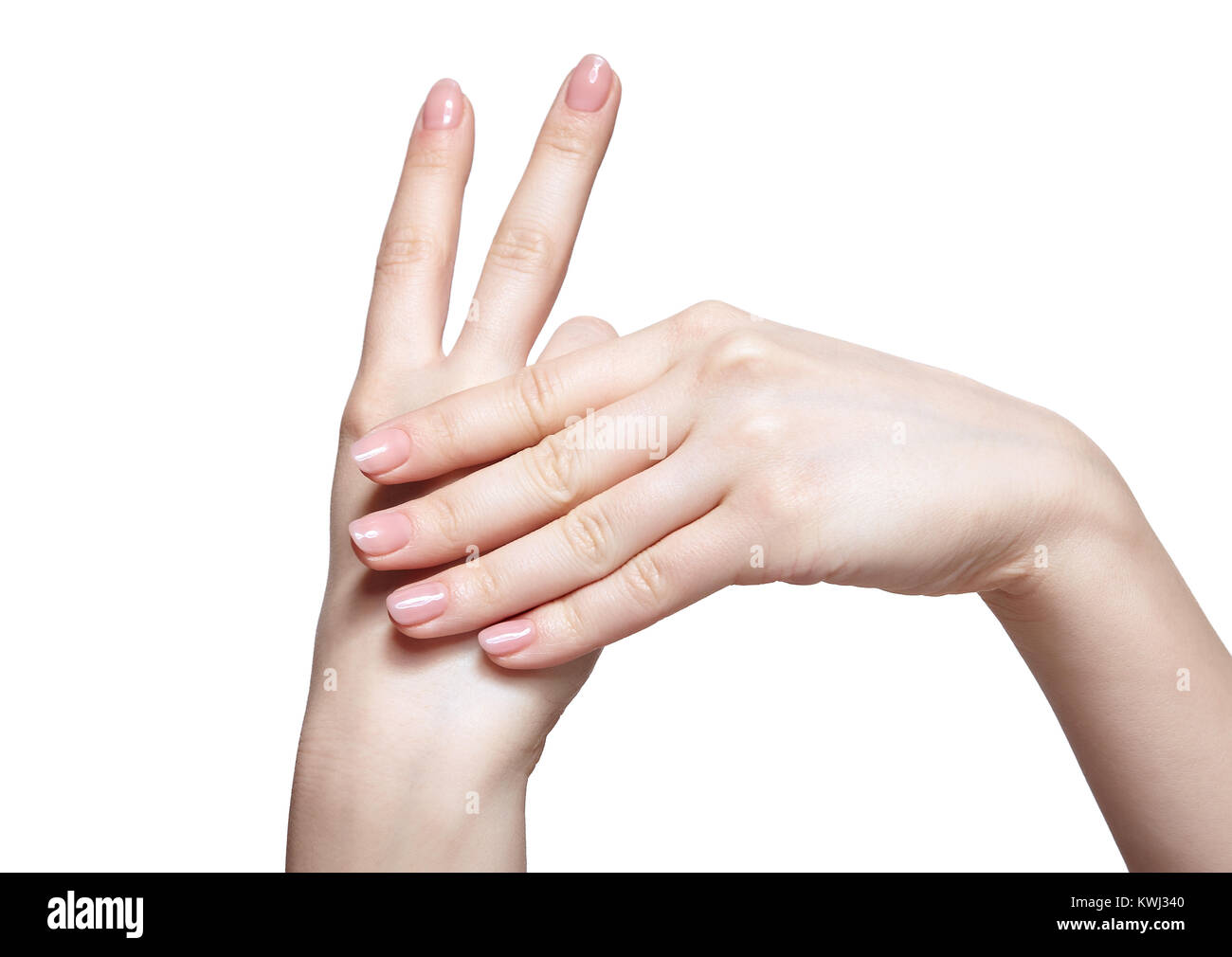 Weibliche Hände mit Frau Rosa natursl Nägel Maniküre isoliert auf weißem Stockfoto