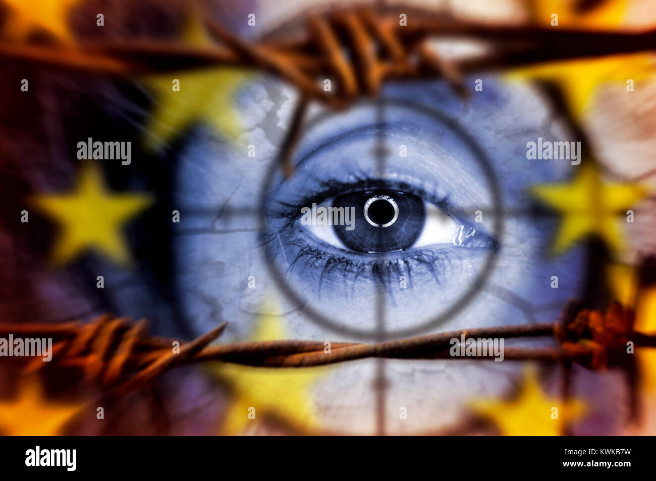 Auge hinter Stacheldraht, Krise der symbolischen Foto Flüchtling, Auge hinter Stacheldraht, chtlingskrise Symbolfoto Fl? Stockfoto