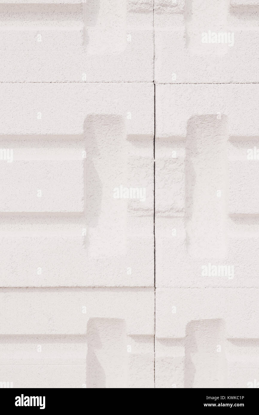 Baumaterial belüftet Betonblöcke an einem Gebäude in der Basis Stockfoto