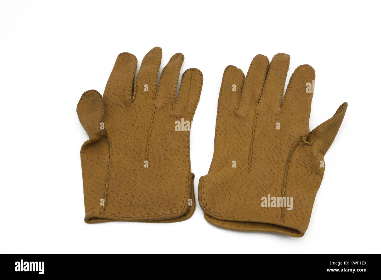 Ein Paar braune Kid Leder Handschuhe Stockfoto