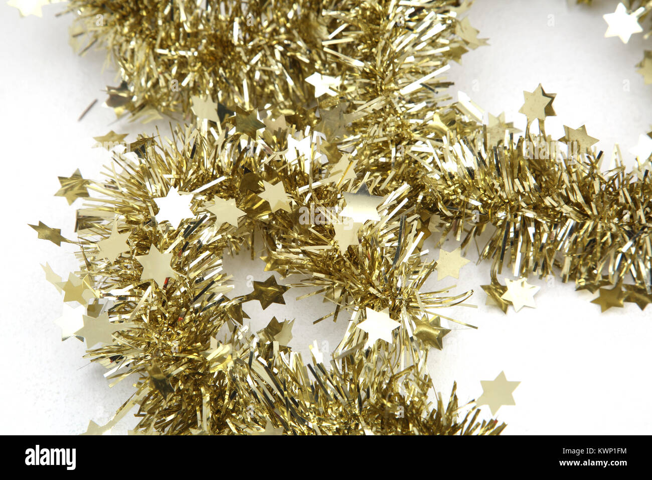 Weihnachten Deko Lametta Gold mit Sternen Stockfoto