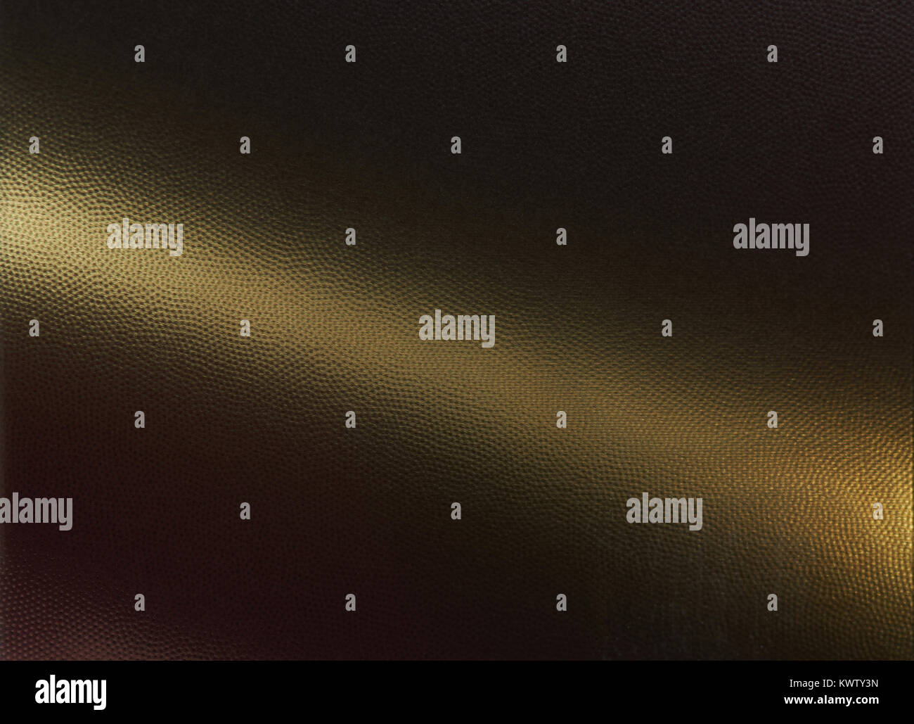 Metall Golden mesh Hintergrund mit Punkten. Perforierte metallische Textur Stockfoto