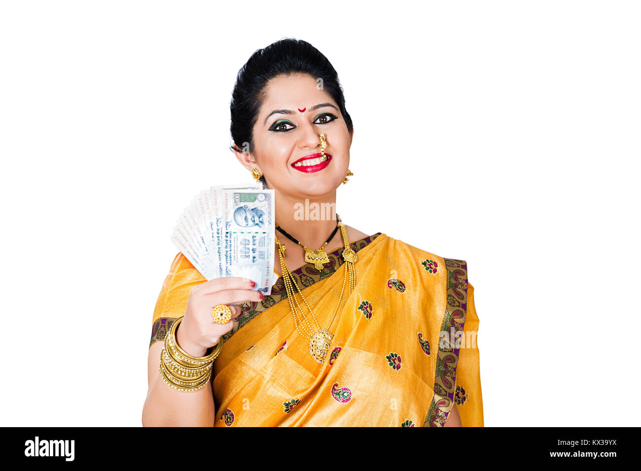 Traditionelles indisches Marathi Frau, Rupess Hinweis Geld sparen Stockfoto