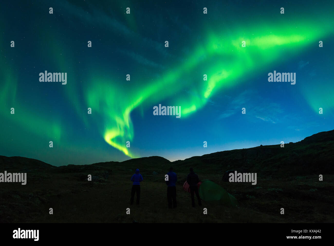 Northern Lights, Vor 3 Personen, Westgrönland, Grönland Stockfoto
