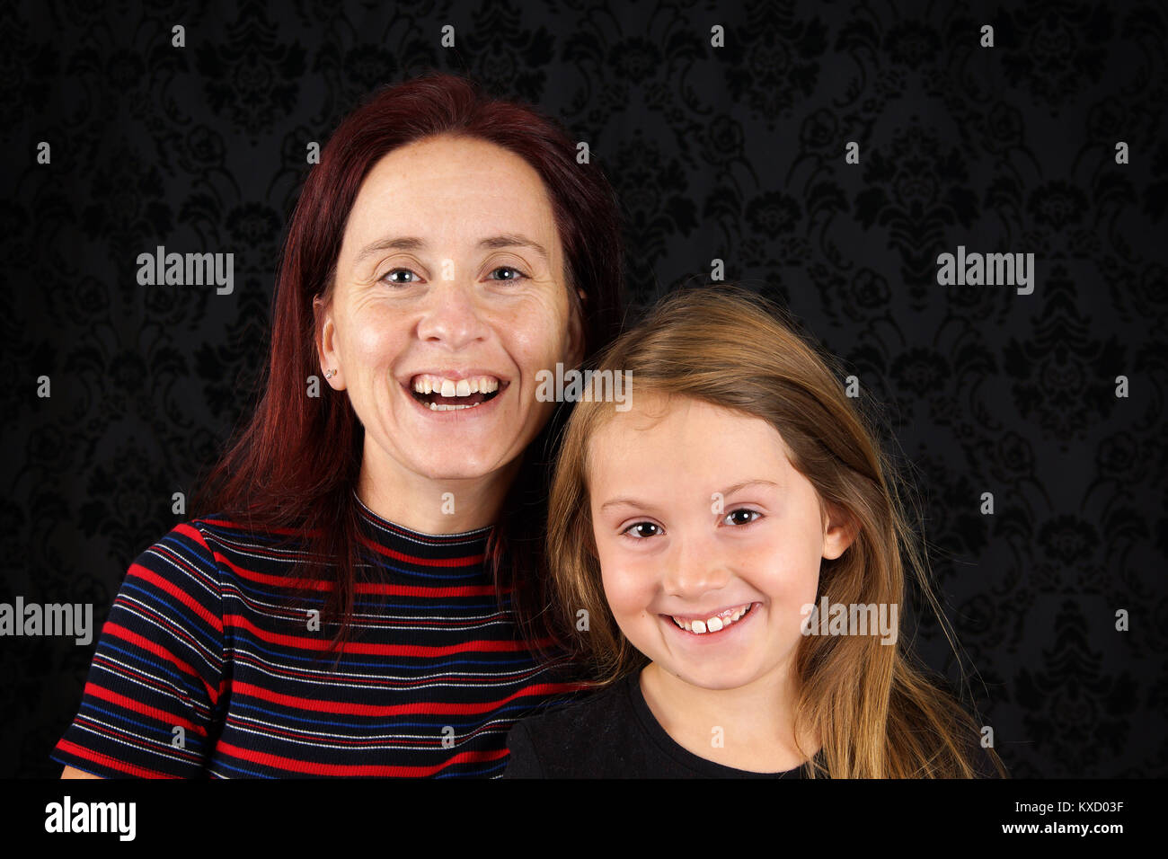 Glückliche Mutter und Tochter portrait Stockfoto