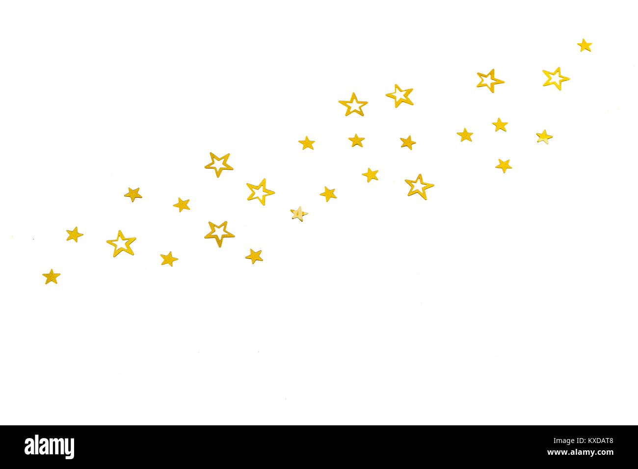 Wasserfälle von Golden glitter Partikeln Sterne auf weißem Hintergrund, happy new year holiday Konzept Stockfoto