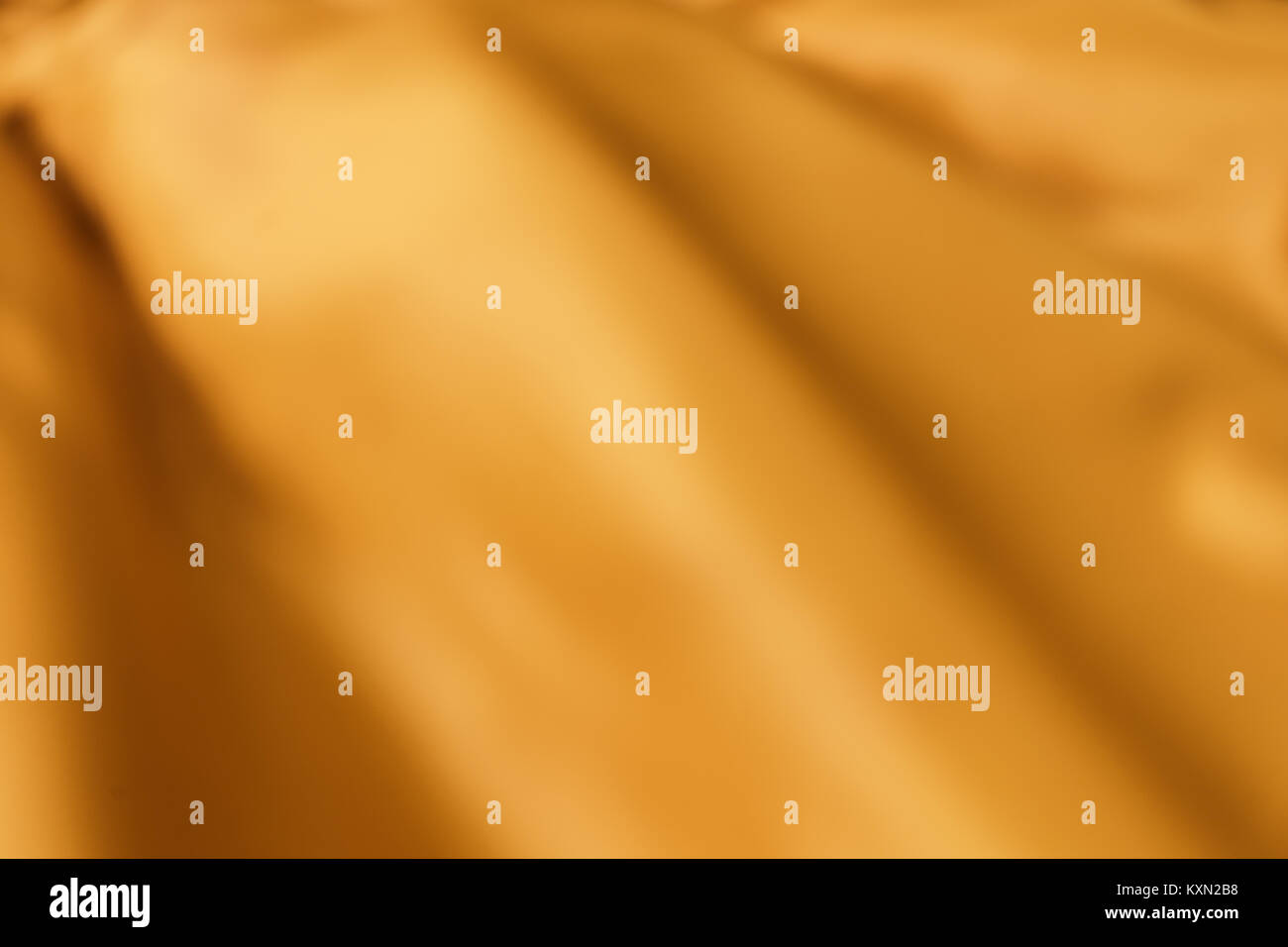 Blur orange aus zerknitterten Hintergrund, in der Nähe Stockfoto