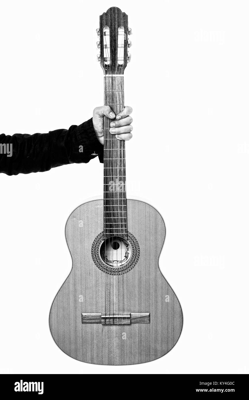 Nahaufnahme einer akustischen Gitarre in einem Mann die Hand weiß Stockfoto