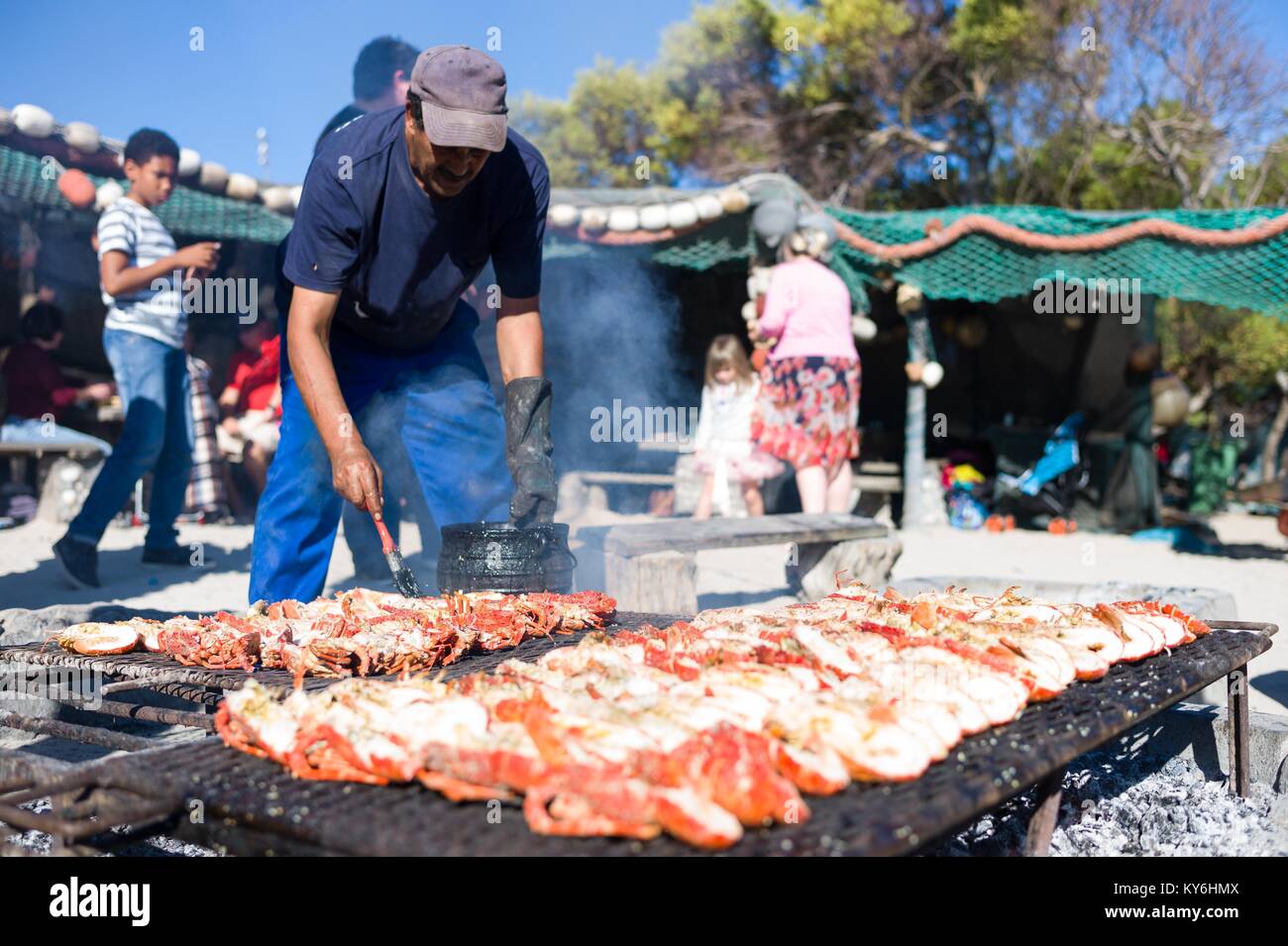 Kochen eine Strand-BBQ-Fest in Langebaan, West Coast, ein traditionelles Sommer Südafrikanischen kulturellen Aktivitäten Stockfoto