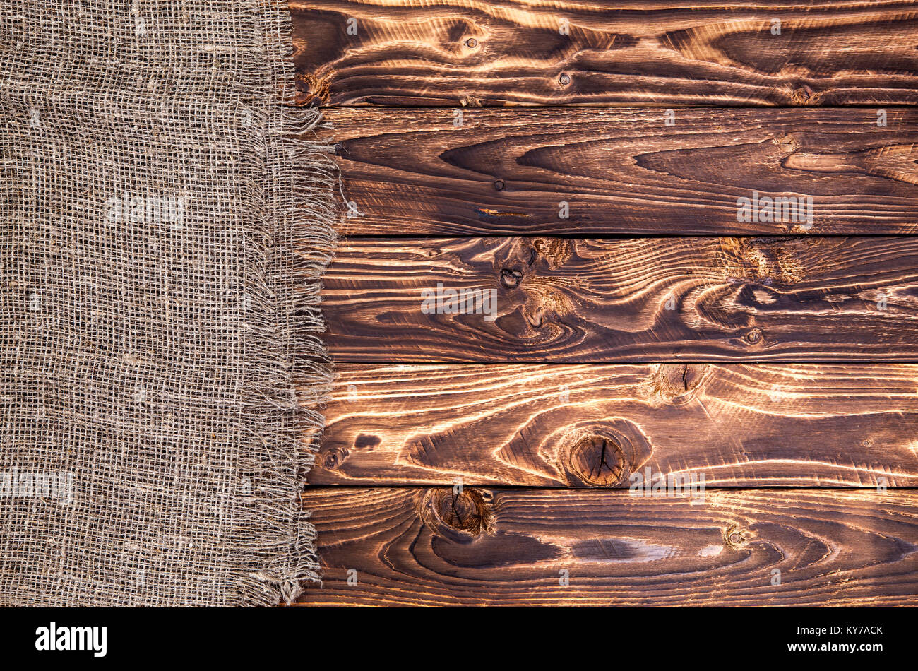 Dunkle Holz- Hintergrund mit Sackleinen, rustikalen, mit Holz und Sack Stockfoto