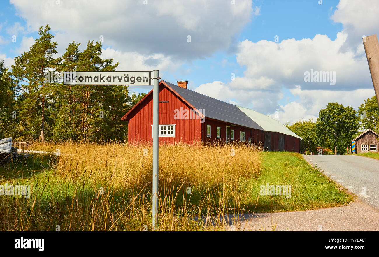 Ländliche Dorf Szene mit traditionellen Holzhäusern, Ljustero, Stockholm, Schweden, Skandinavien. Stockfoto