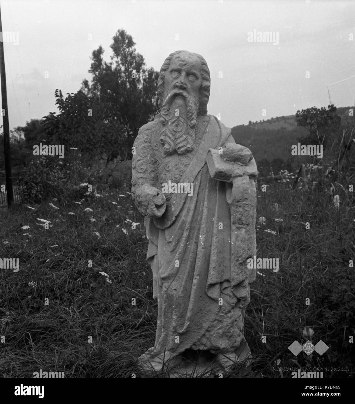 Sv. Ivan, Po izročilu iz Künstlerin Podvrčnik. Cerkvici oltarjem Sedaj za v Sv. Ivana (kamen, 87 cm visok), (Podgrad pri Rodiku 1955 6) Stockfoto