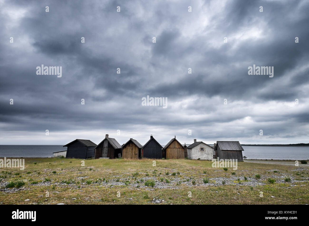 Reihe von Remote angeln Hütten am Rande der Ostsee. Ort: Faro Island, Schweden Stockfoto