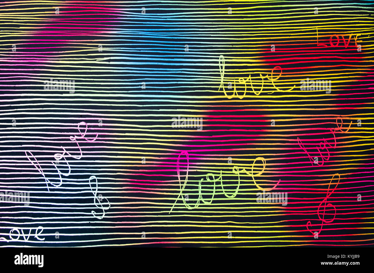 Wort Liebe auf bunten Hand gemalten Hintergrund gemischte Farben Stockfoto