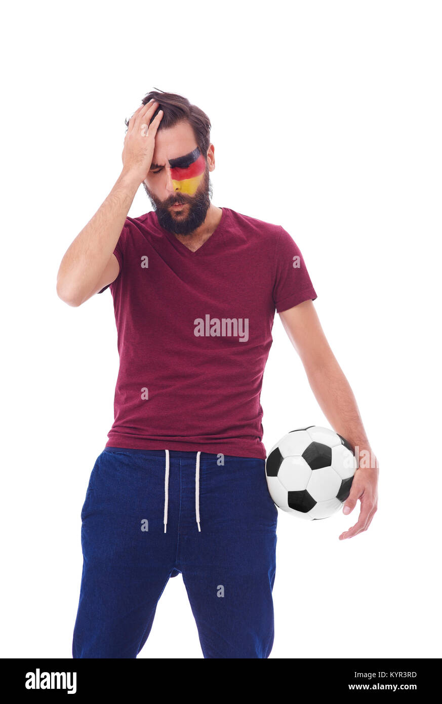 Enttäuscht Fußballfan mit Fußball Stockfoto