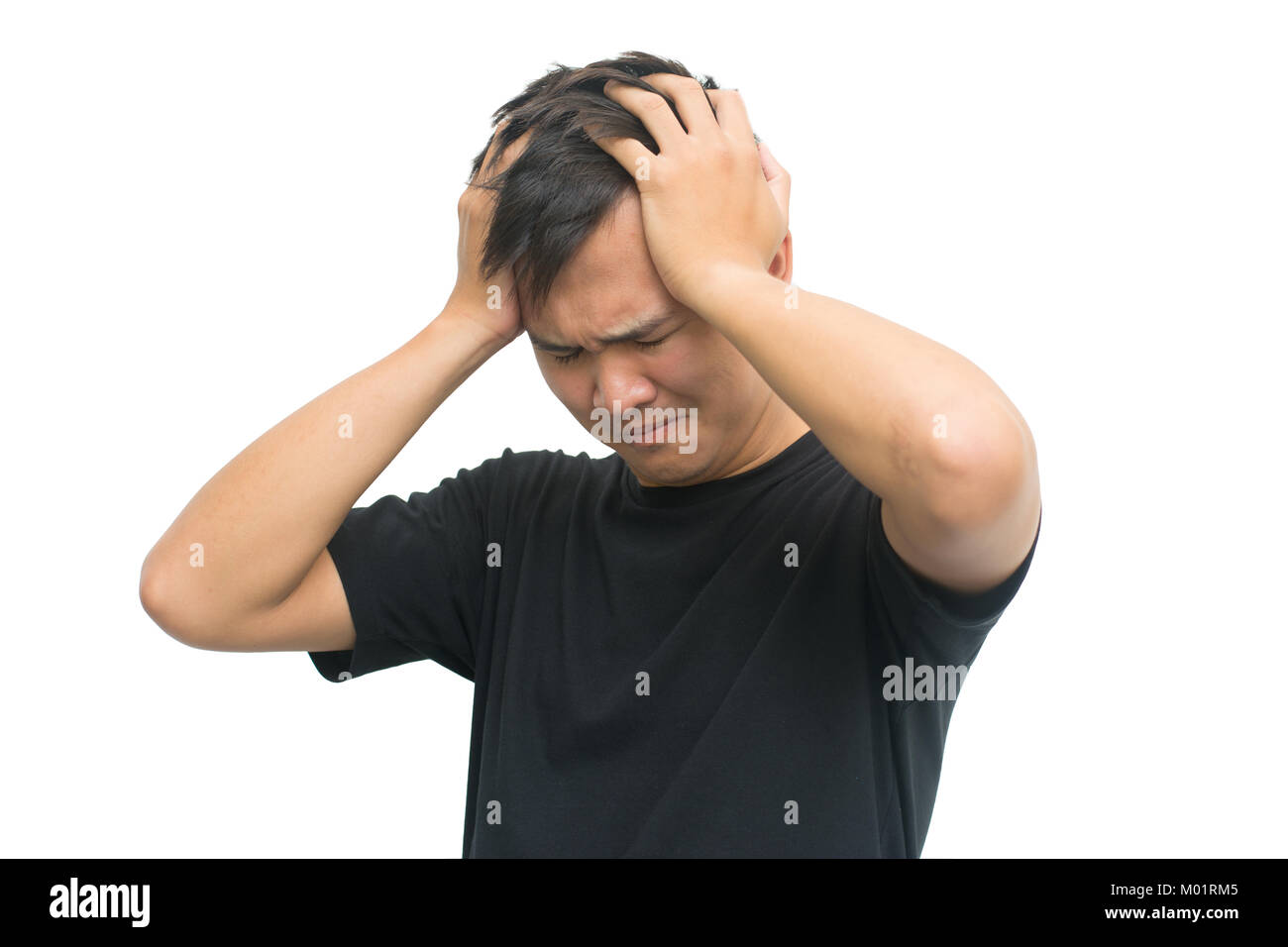 Junger Mann mit Kopfschmerzen - auf weißem Hintergrund mit freistellungspfad Isoliert frustriert Stockfoto