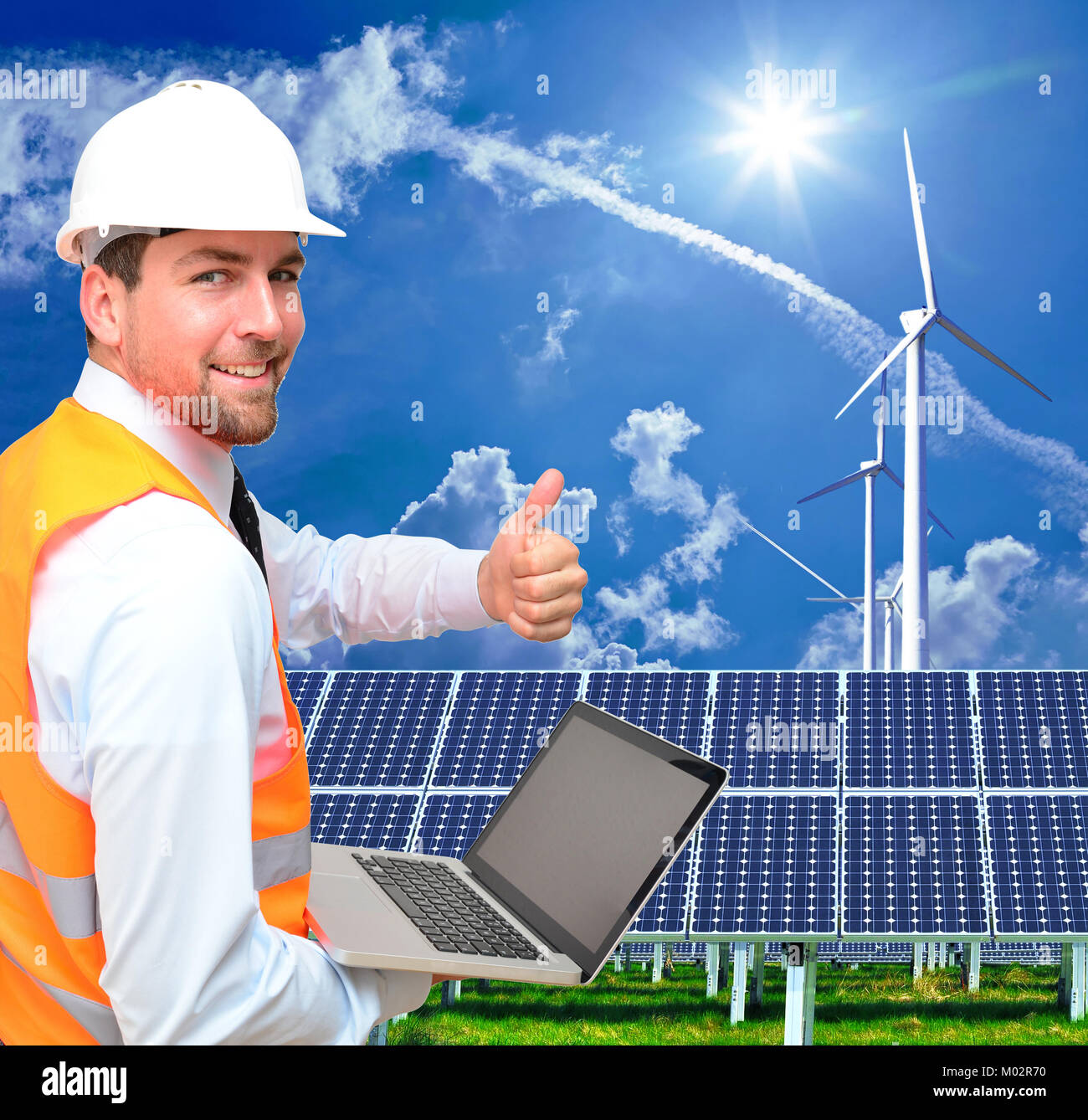 Ingenieur arbeitet in der Energiewirtschaft - Umweltfreundliche Energieerzeugung mit alternativen Energien wie Wind- und Solarenergie Stockfoto