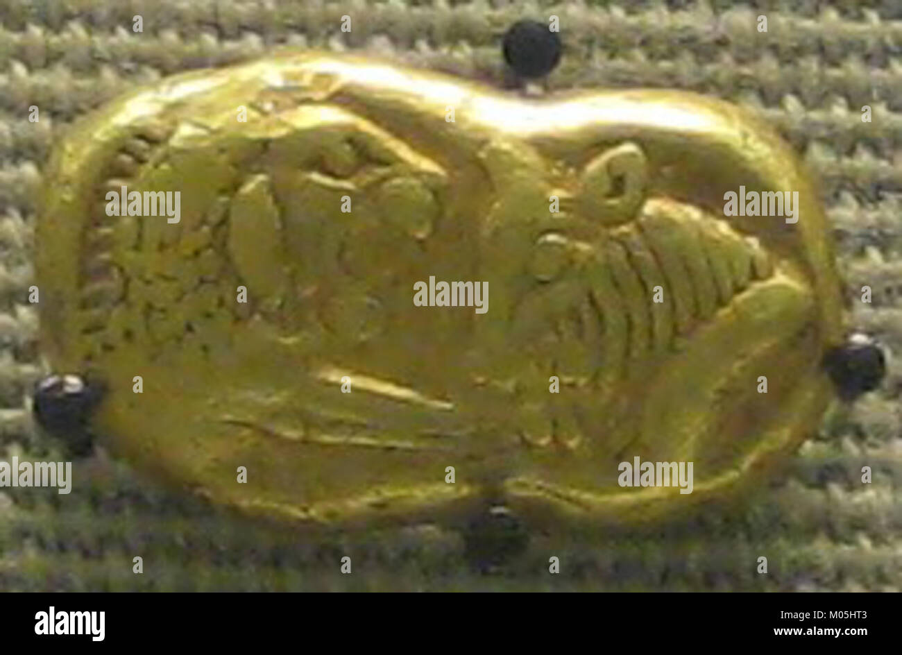 Das British Museum beherbergt eine Goldmünze aus der Herrschaft von Croesus, einem wohlhabenden König von Lydia. Die Münze ist ein bemerkenswertes Artefakt in der Erforschung der antiken Numismatik und Geschichte. Stockfoto