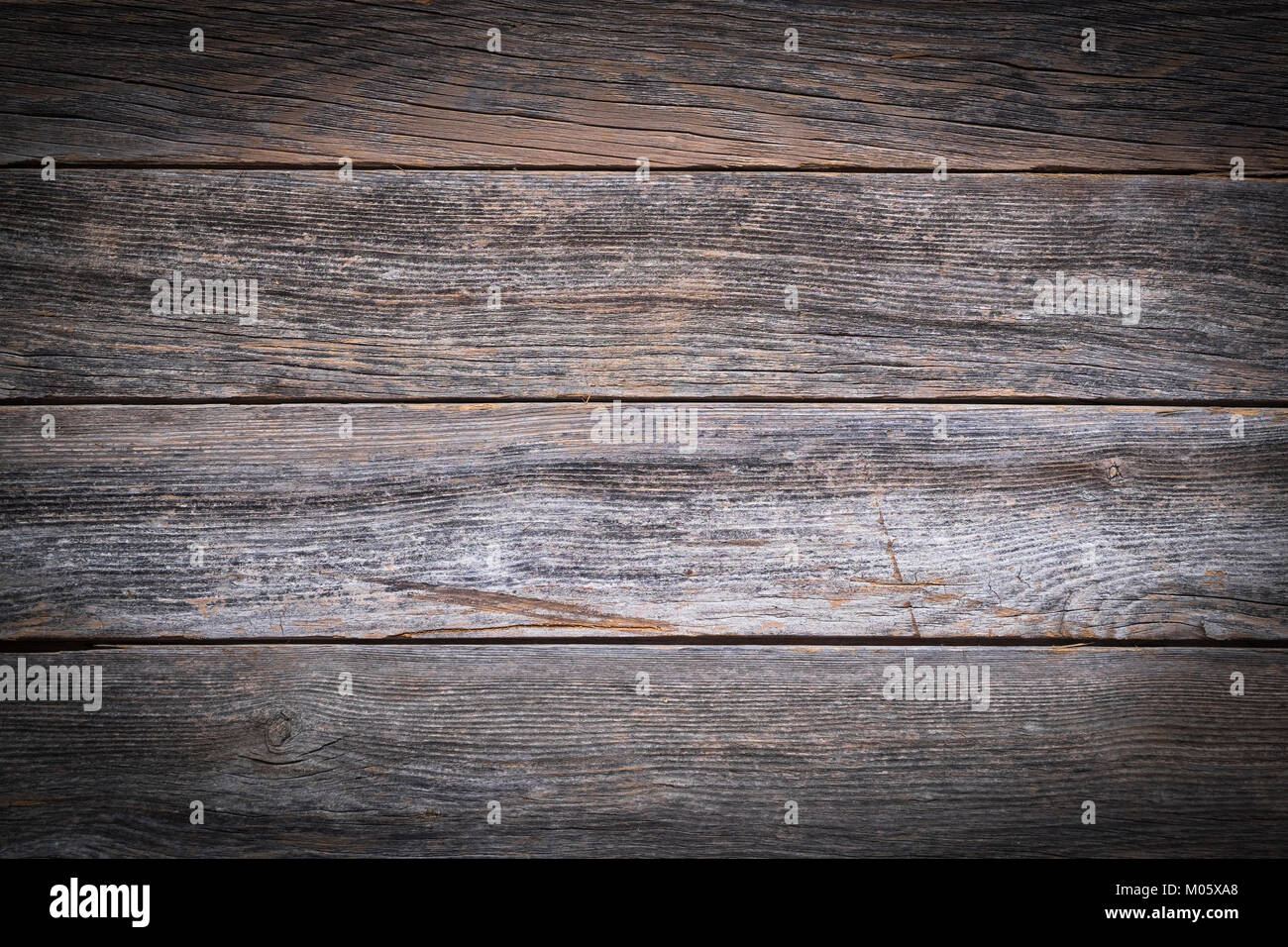 Ein rustikales Holz- Hintergrund aus verwittertem Boards Stockfoto