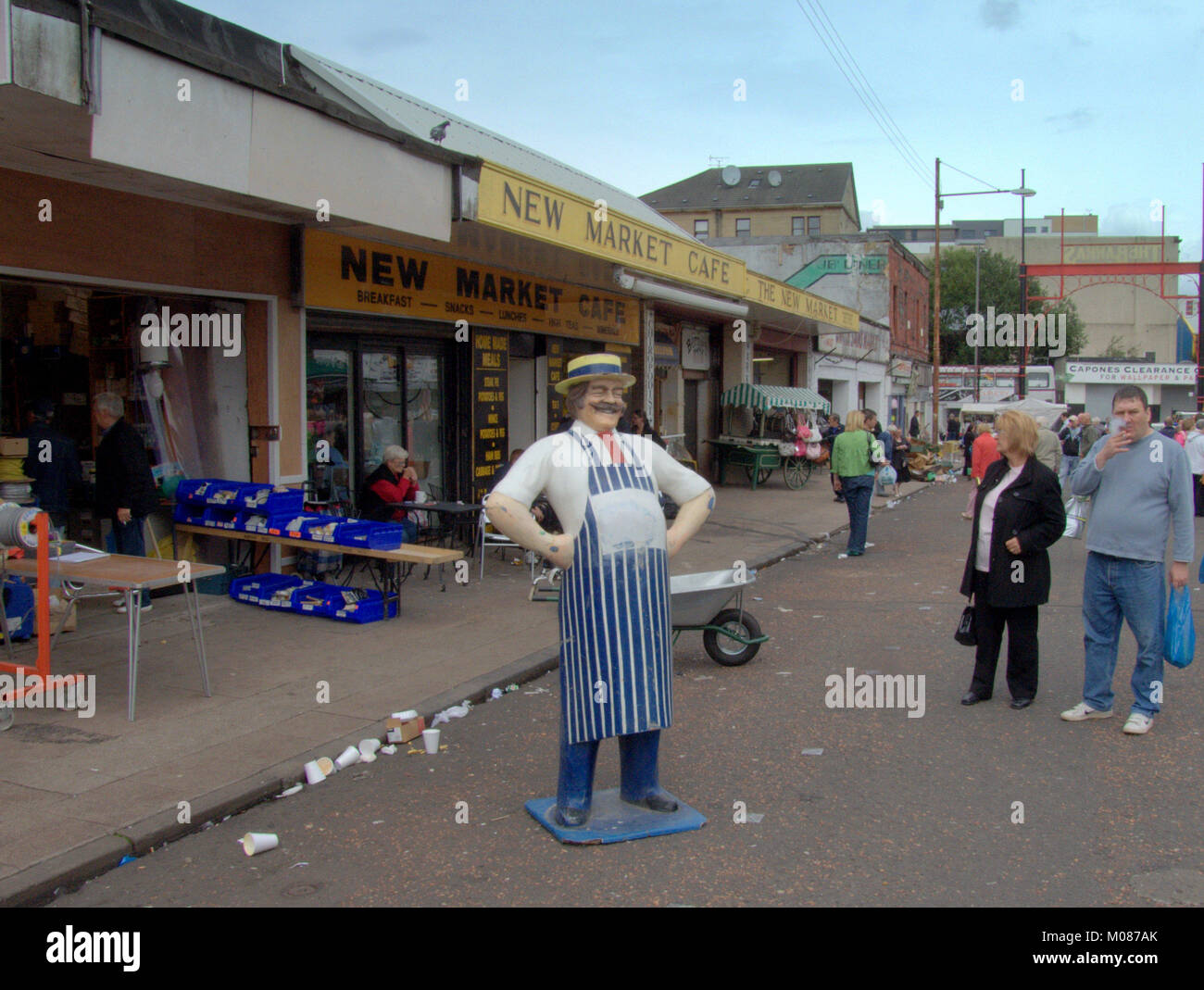 Metzger Normpuppe prop Werbung barras Market Street stände Szene mit standbesitzer und Kunden Stockfoto