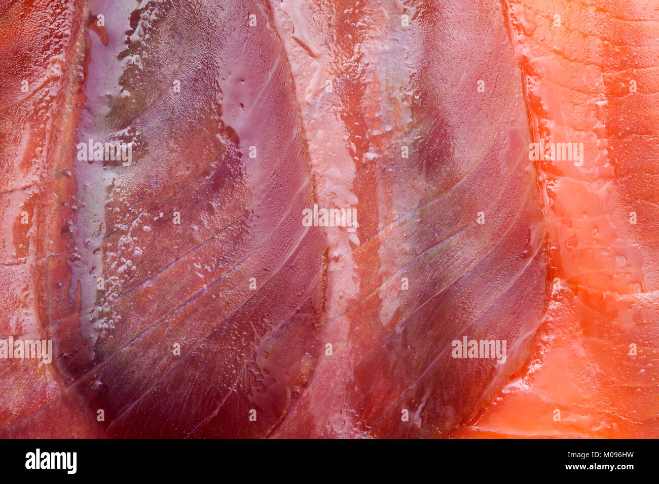 Scheiben von Fettigen geräucherten Fisch deli Essen bacground Stockfoto