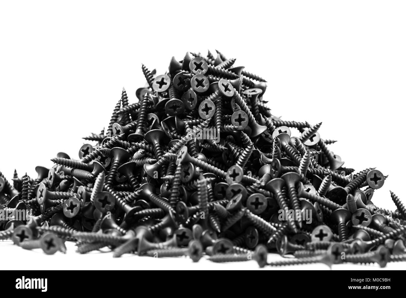 Gruppe von schwarzen Schrauben für die Befestigung von Gipskartonplatten  auf Metallprofilen Stockfotografie - Alamy