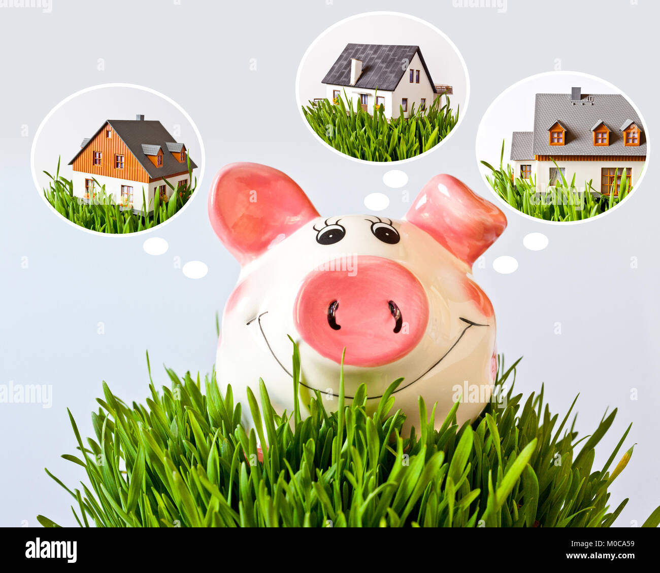 Wirtschaft und Finanzen - piggy Bank mit geträumt - Einsparungen für ein neues Haus Stockfoto