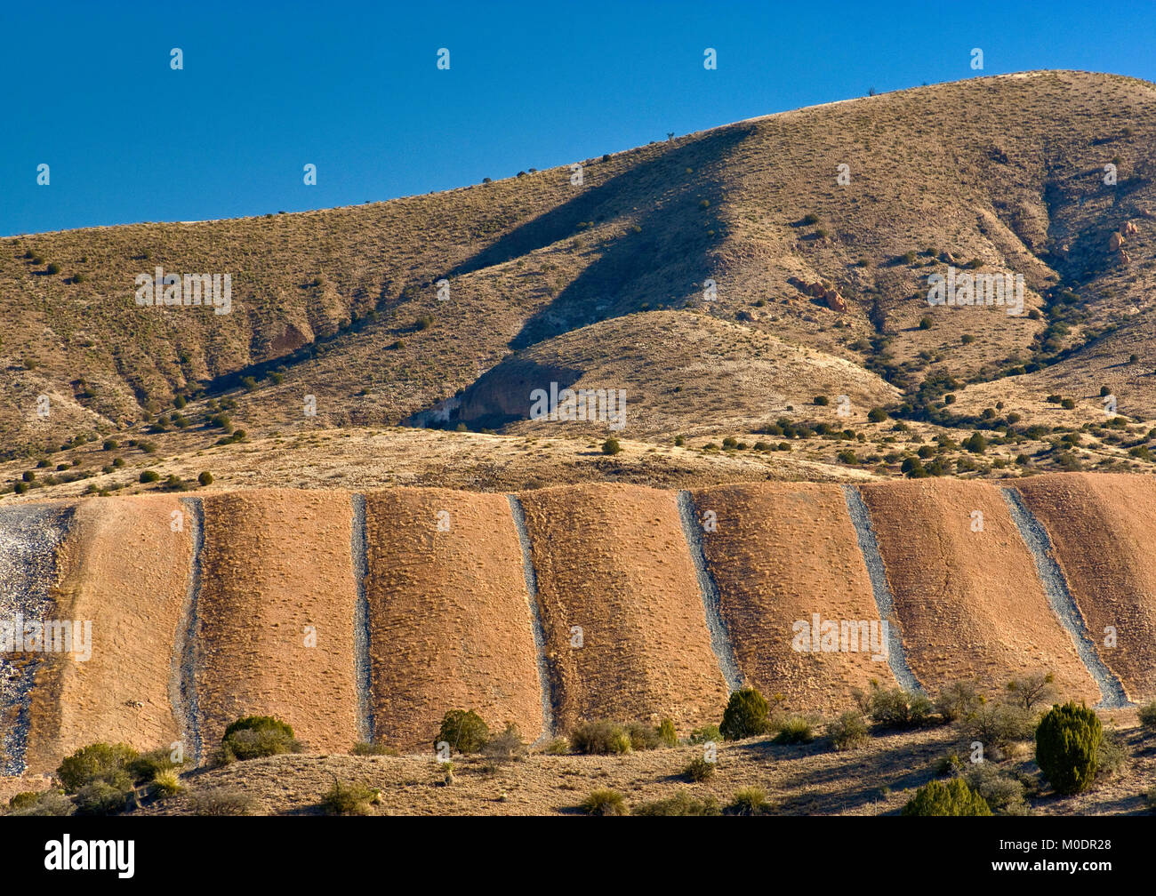 Aufgearbeitete Lagerbestände von industriellen Abfällen auf Freeport-McMoRan Copper & Gold Inc. Tyrone Mine in der Nähe von Silver City, New Mexico, USA Stockfoto