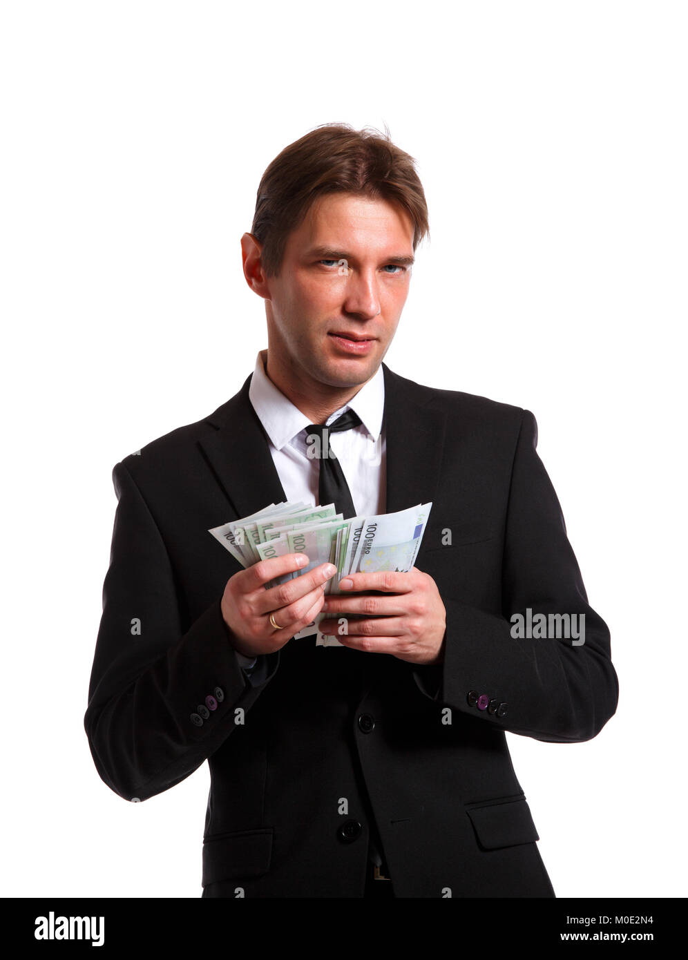 Foto von Mann in Anzug, mit Euro in Händen Stockfoto