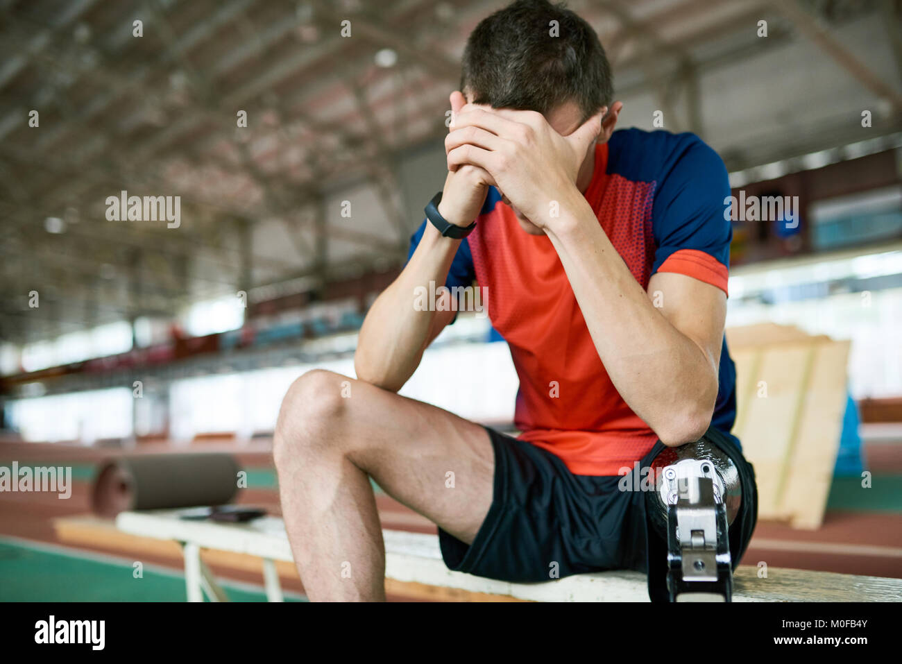 Frustriert behinderte Sportler Stockfoto
