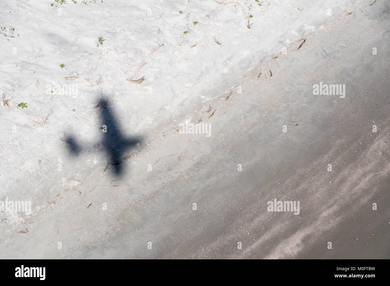 Schatten des Wasserflugzeug über Beach, South Carolina Stockfoto