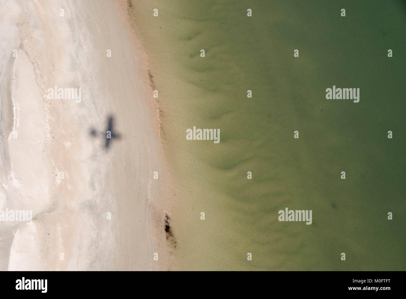 Schatten des Wasserflugzeug über Beach, South Carolina Stockfoto