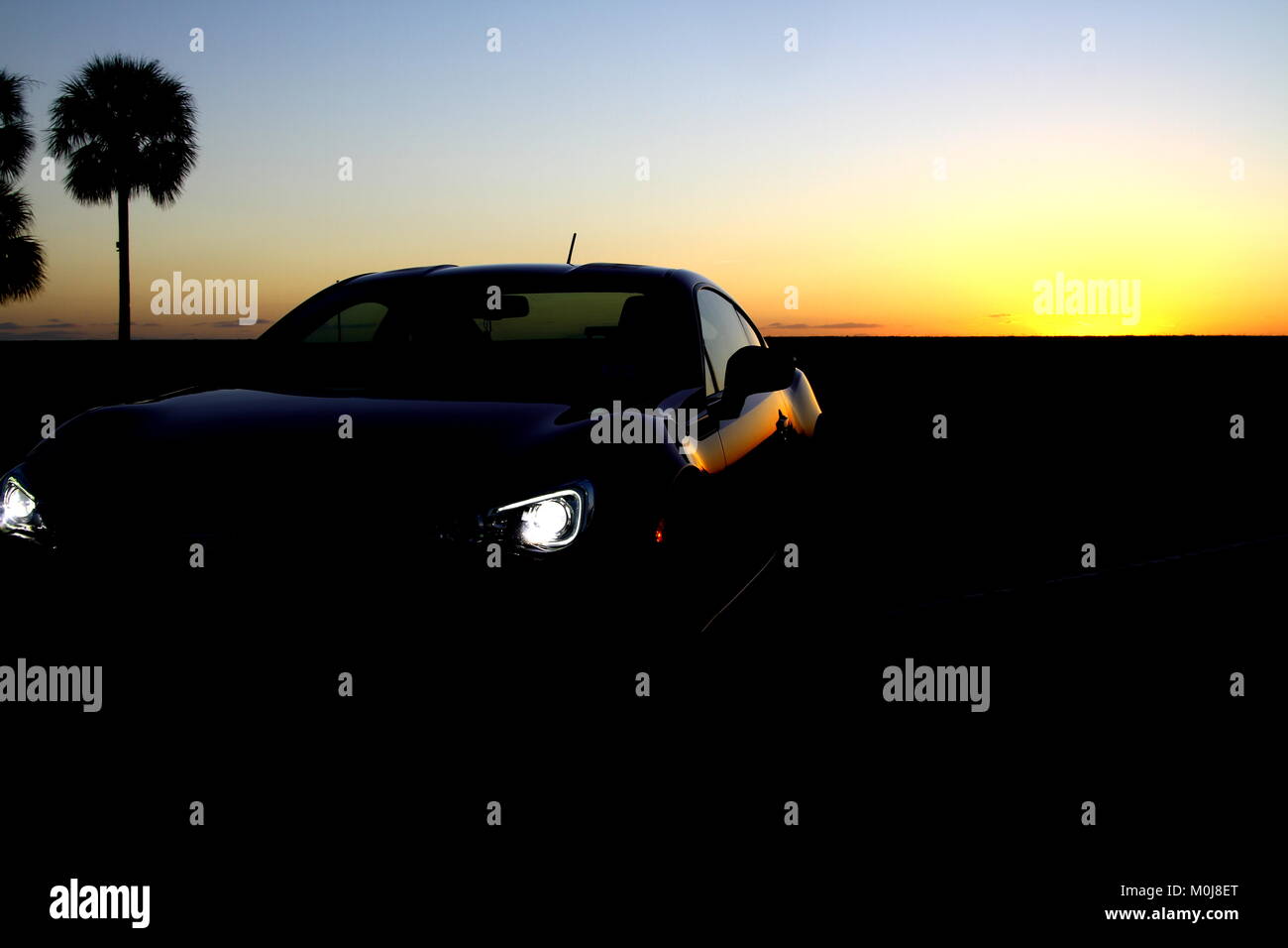 Sportwagen Sunrise Stockfoto