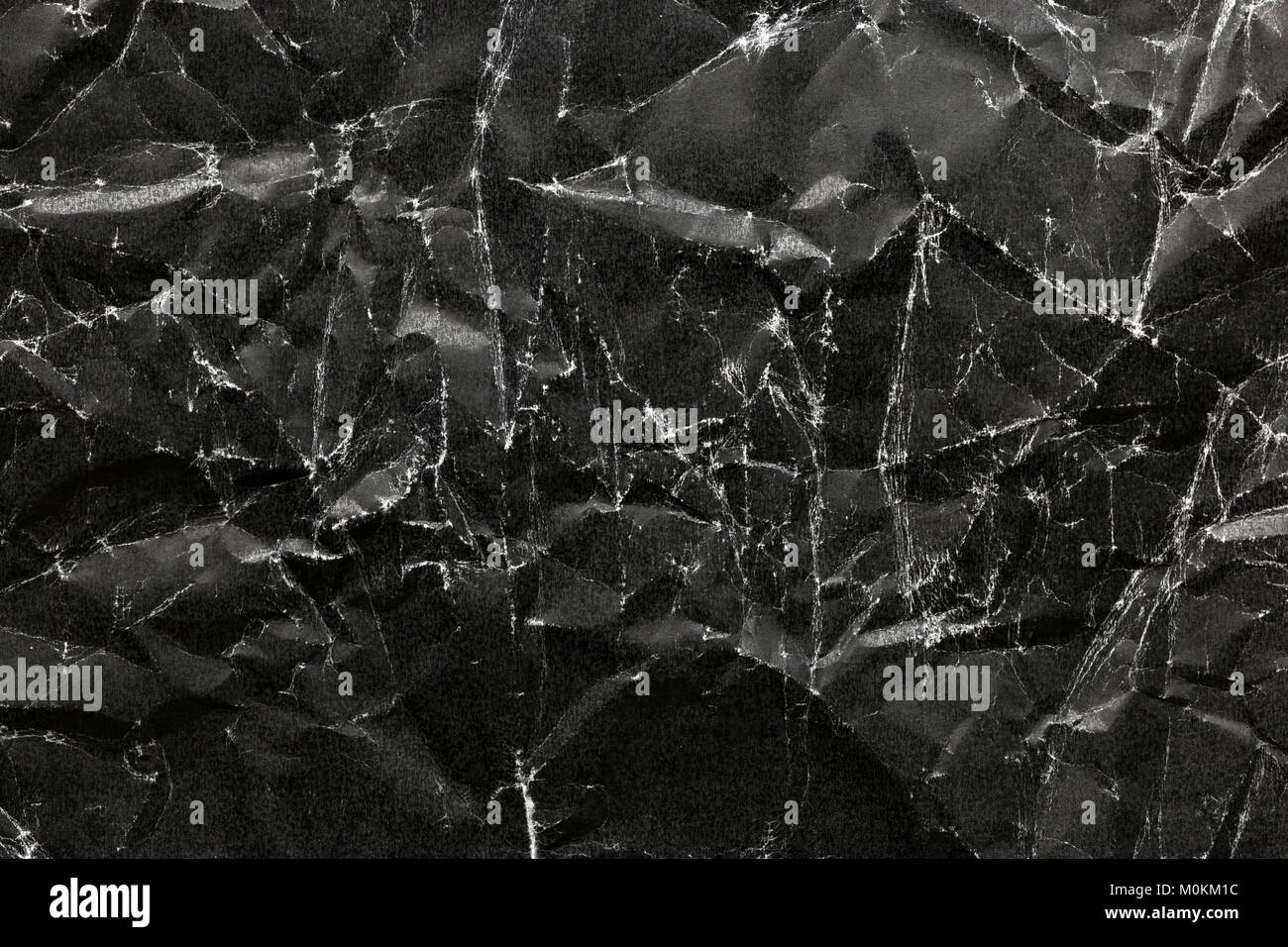 Schwarz zerknittertes Papier Hintergrund, schwarze zerknittertes Papier Textur Stockfoto